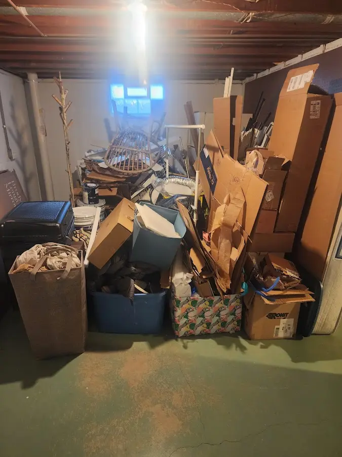 Roll-off dumpster container at job site for 2 Yard Dumpster Rental in South Jordan